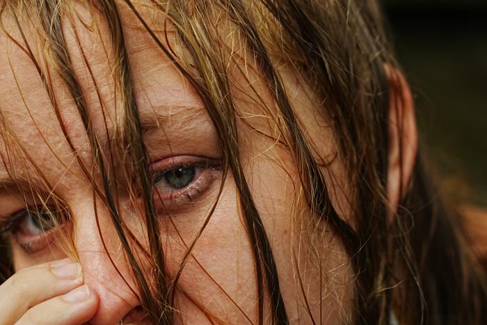 wet hair hand to face intimate close