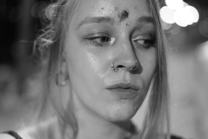B&W woman bindi close-up bokeh