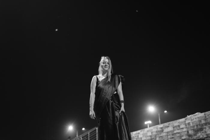 B&W night woman with city lights