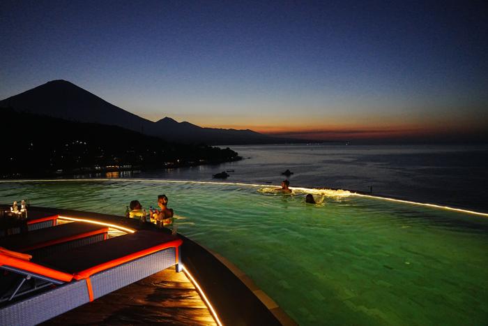 hotel infinity pool dusk with Agung