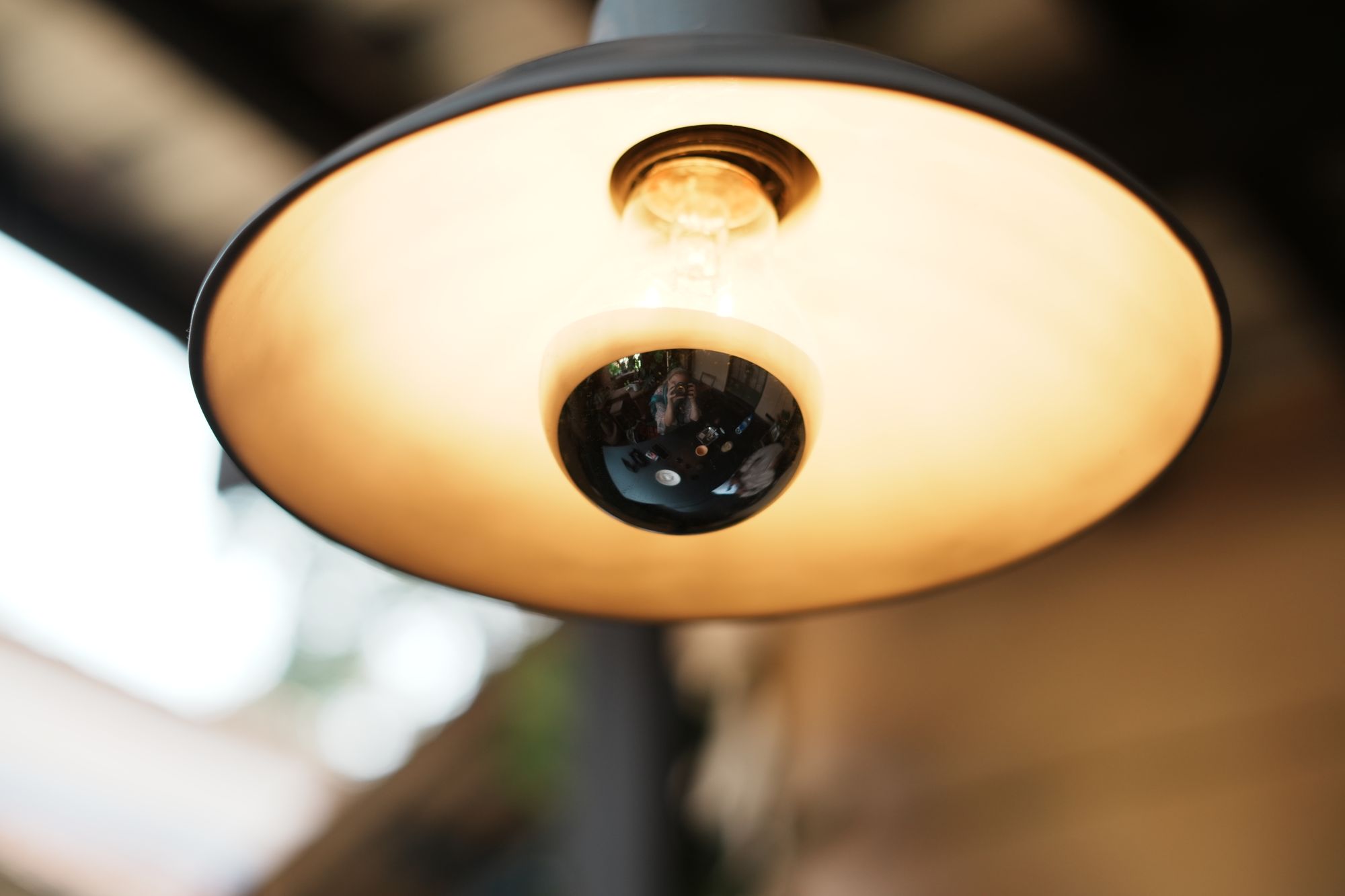 pendant lamps from below, warm cafe