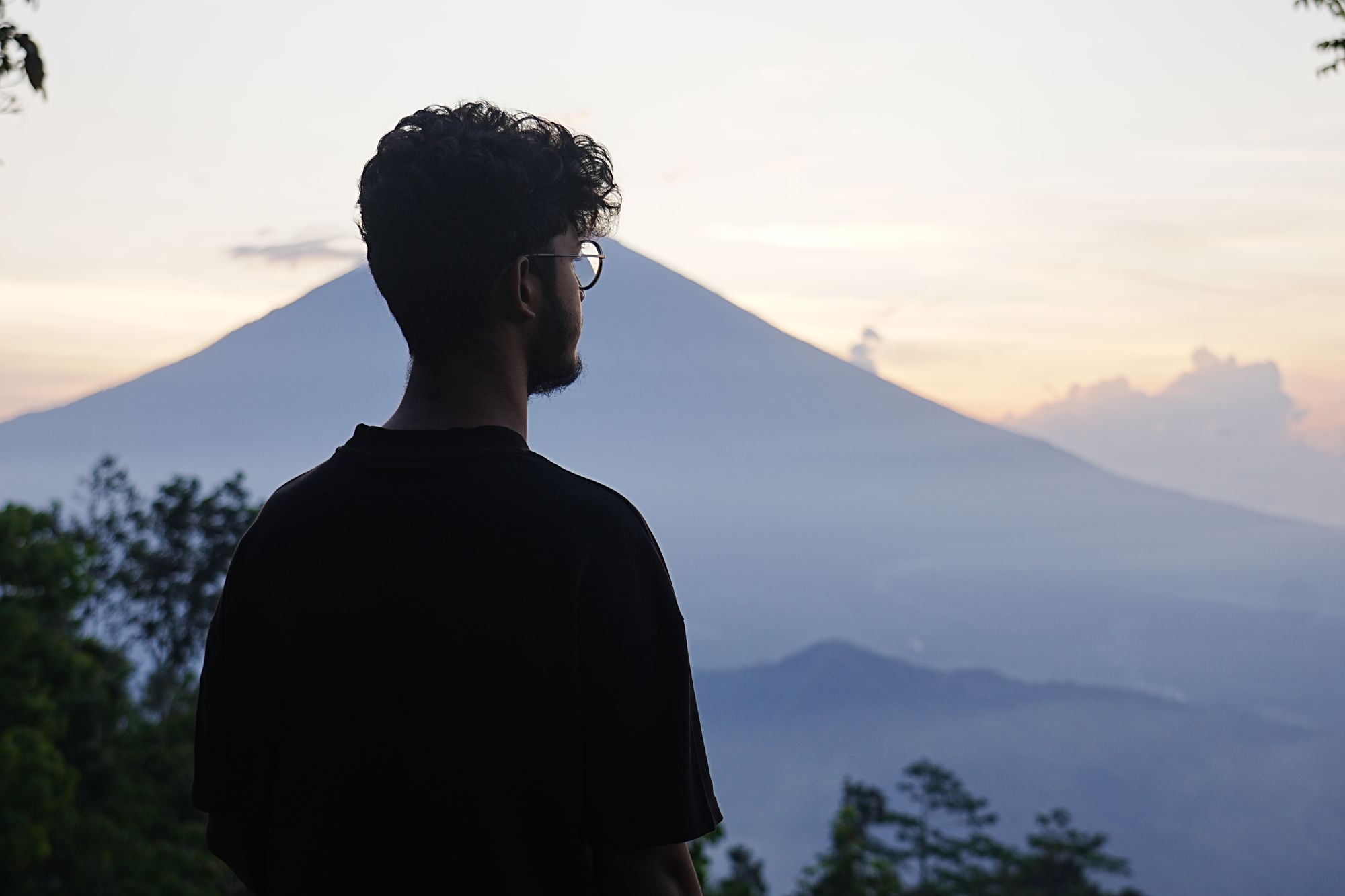 man silhouette vs Agung