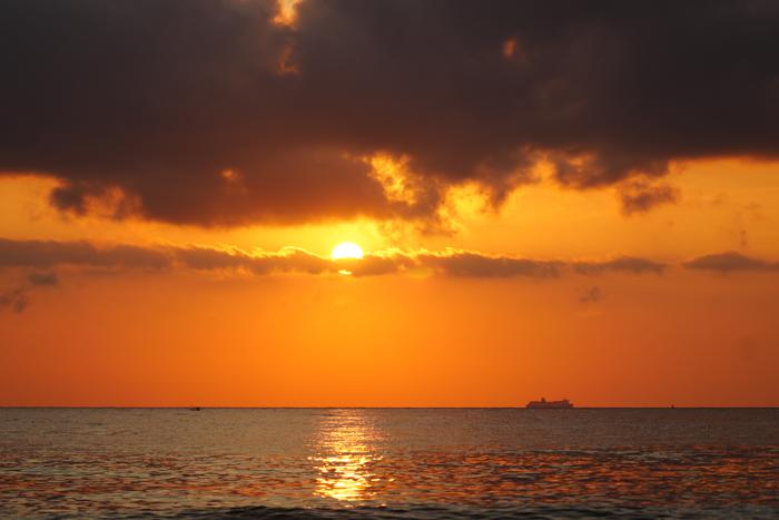 orange sunset sea clouds