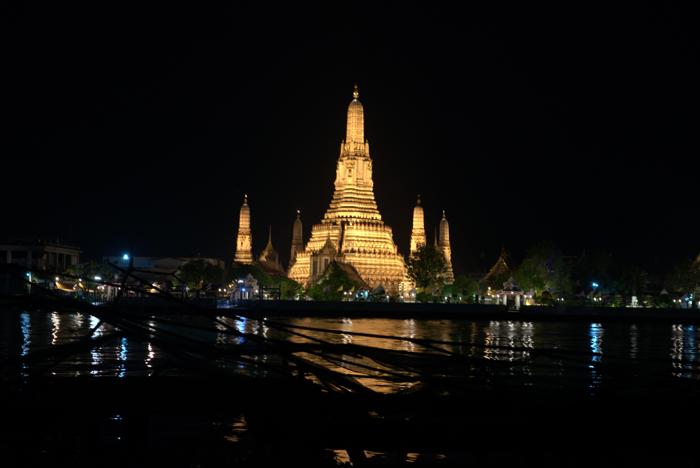 Wat Arun night river reflection