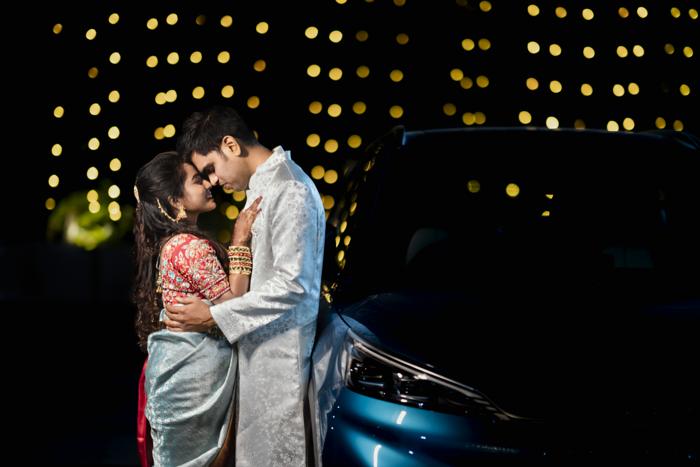 couple with fairy lights at night